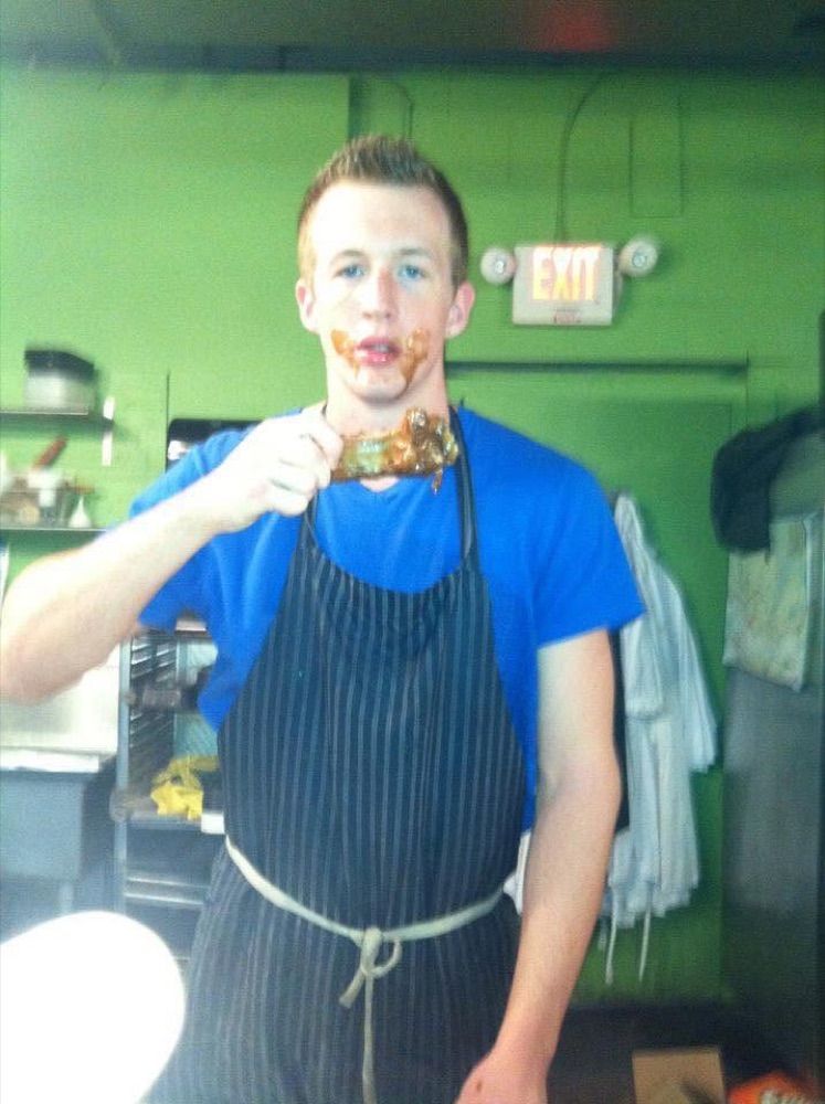 Matthew working in the butcher's shop